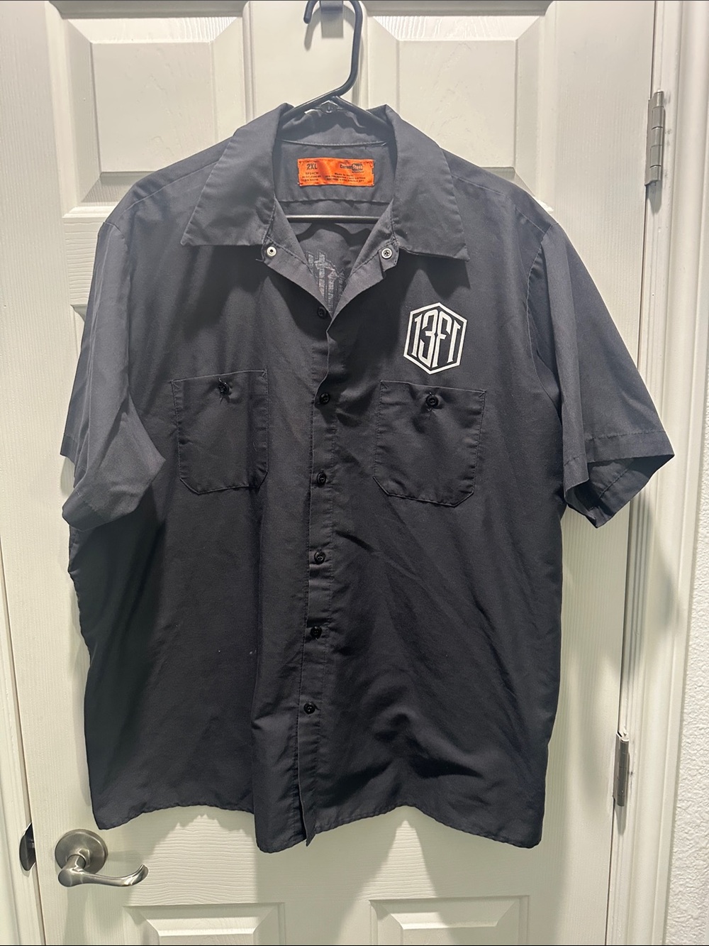 Men's Black Short-Sleeve Button-Up Shirt with Chest Logo
